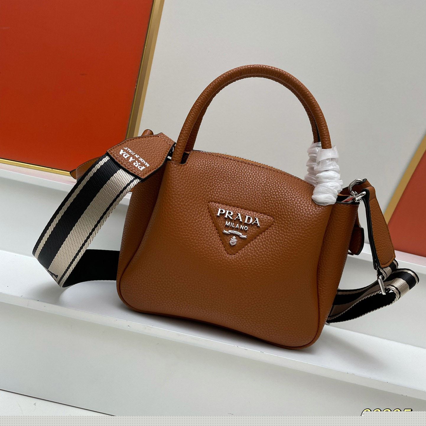 Pra*a top handle bags